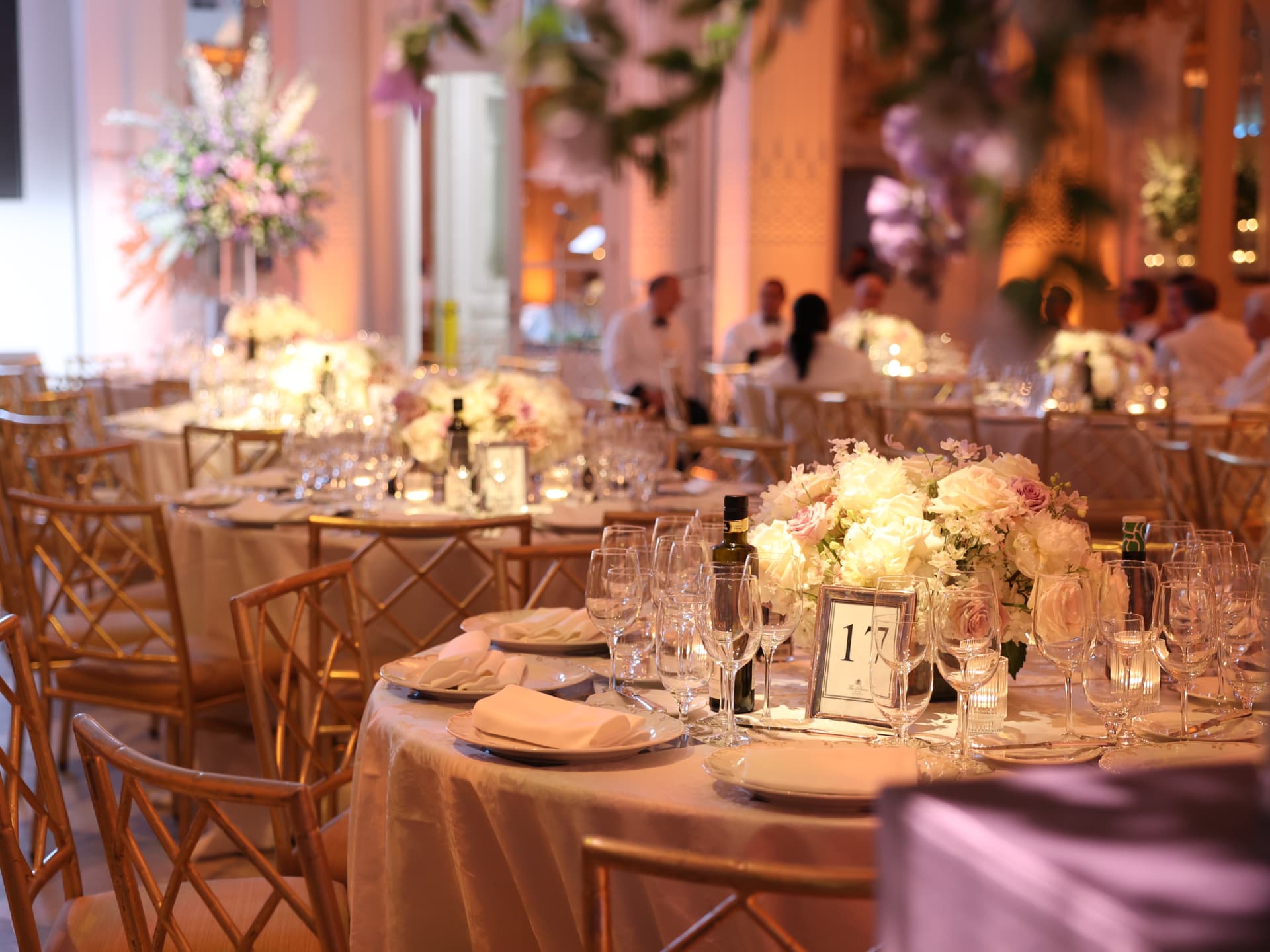 Elegant ballroom reception tables set for a wedding celebration