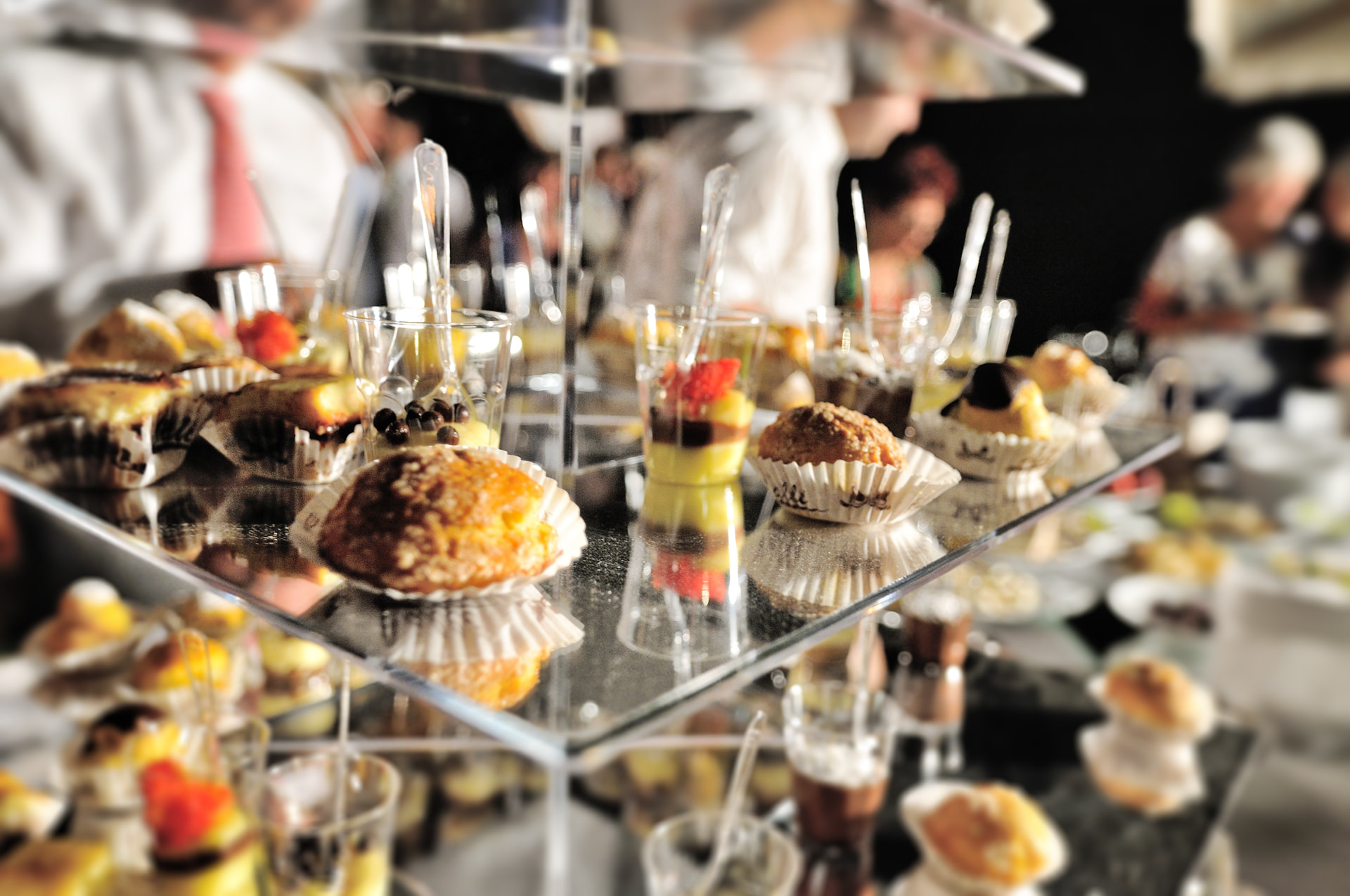 Mirrored display of Italian mignon pastries