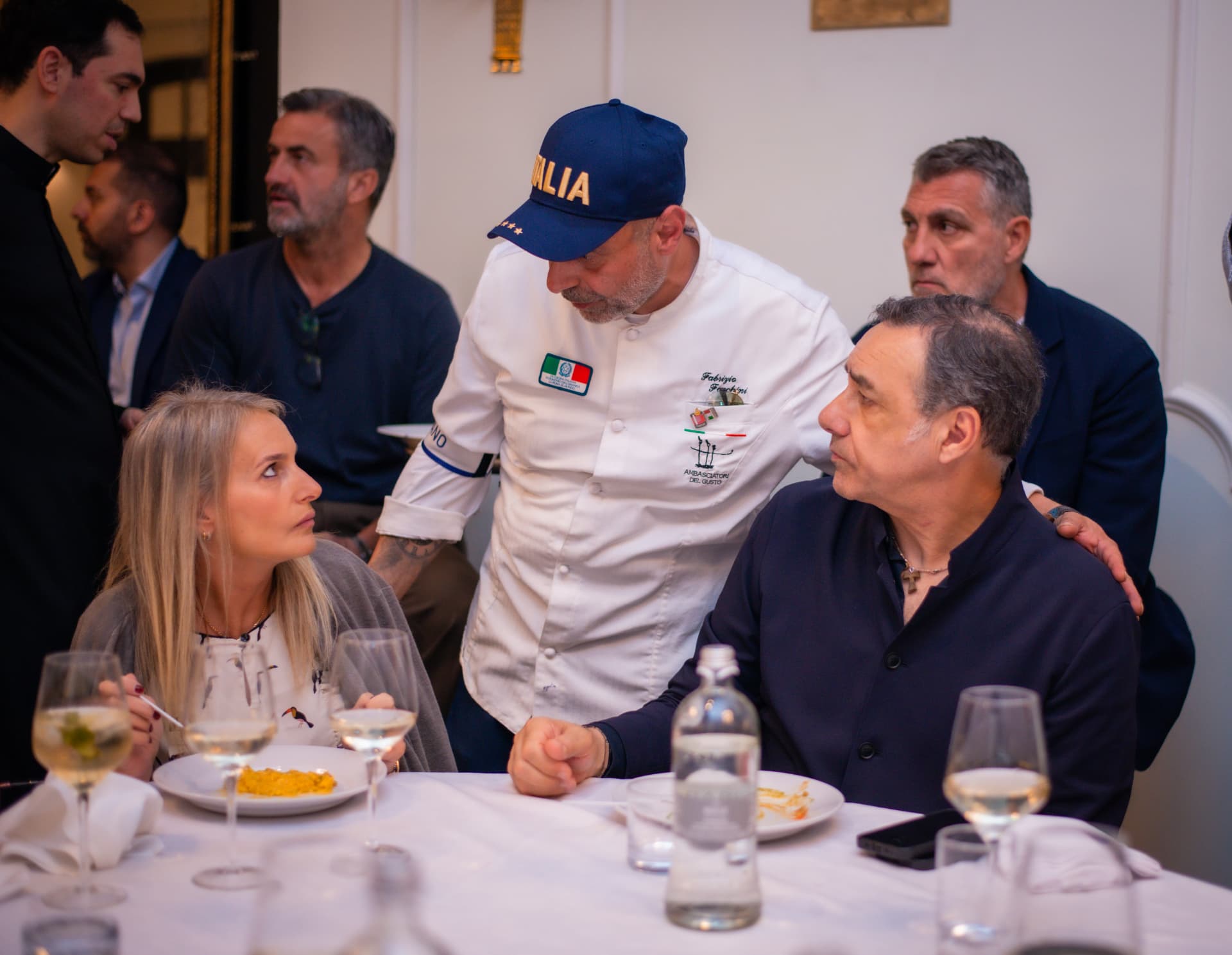 Chef Fabrizio Facchini presenting a course tableside