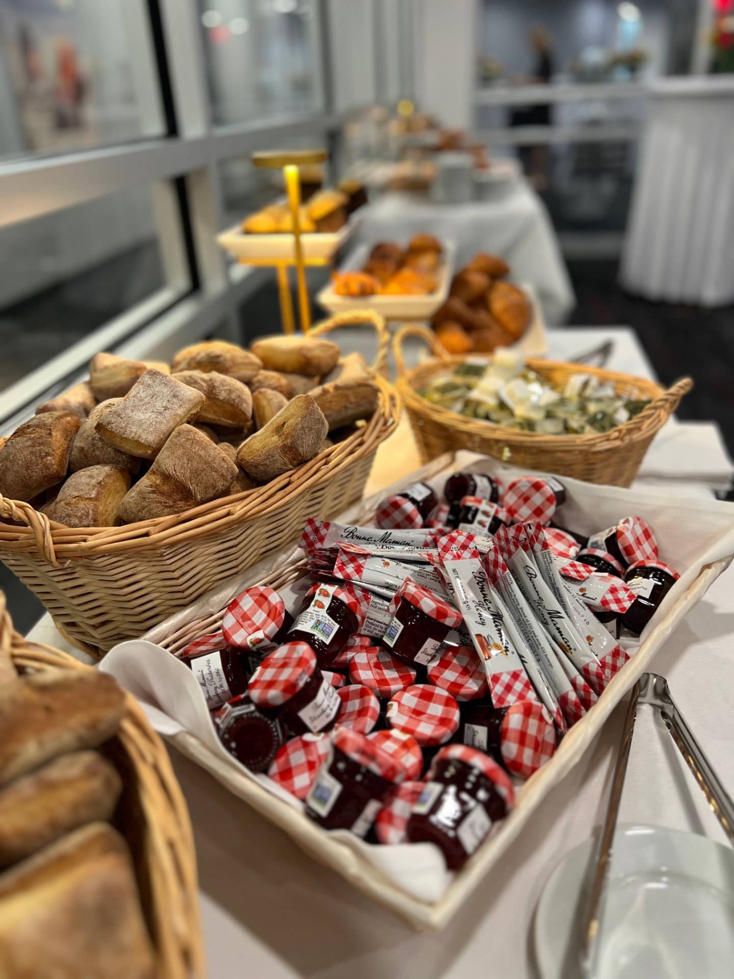 Artisan breads and preserves styled for a corporate catering program