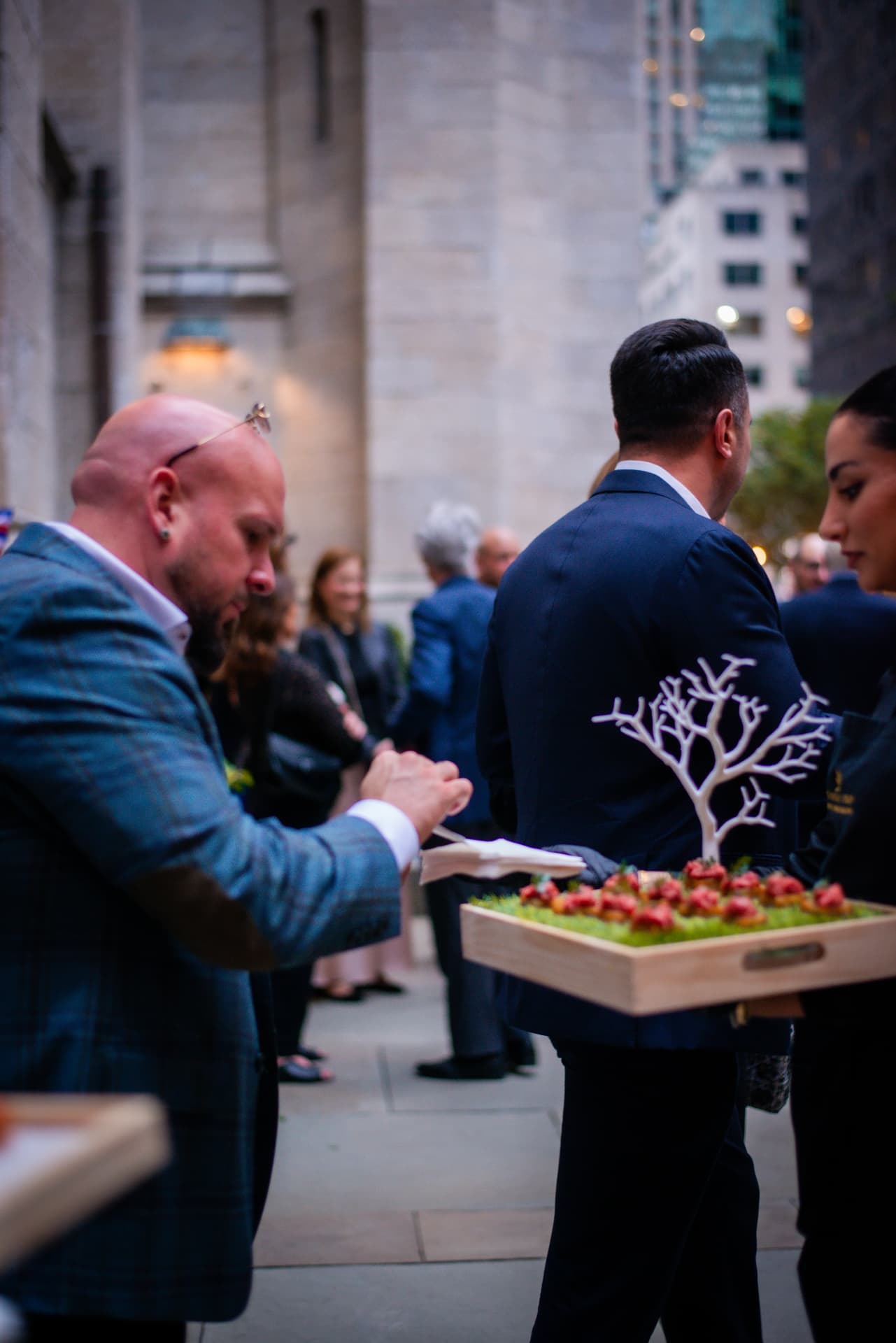 Passed hors d’oeuvres served to guests during a wedding cocktail hour