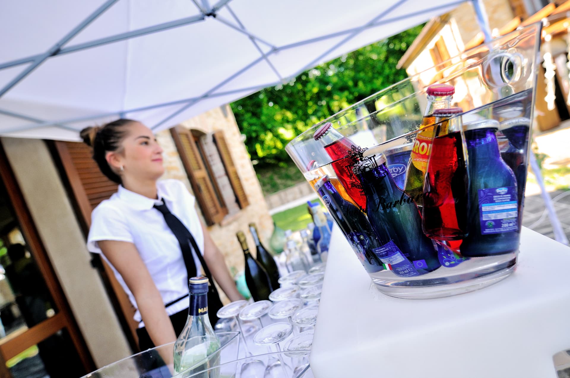 Styled beverage welcome station at an outdoor event