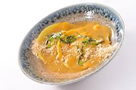 Ravioloni all'astice in a delicate seafood sauce